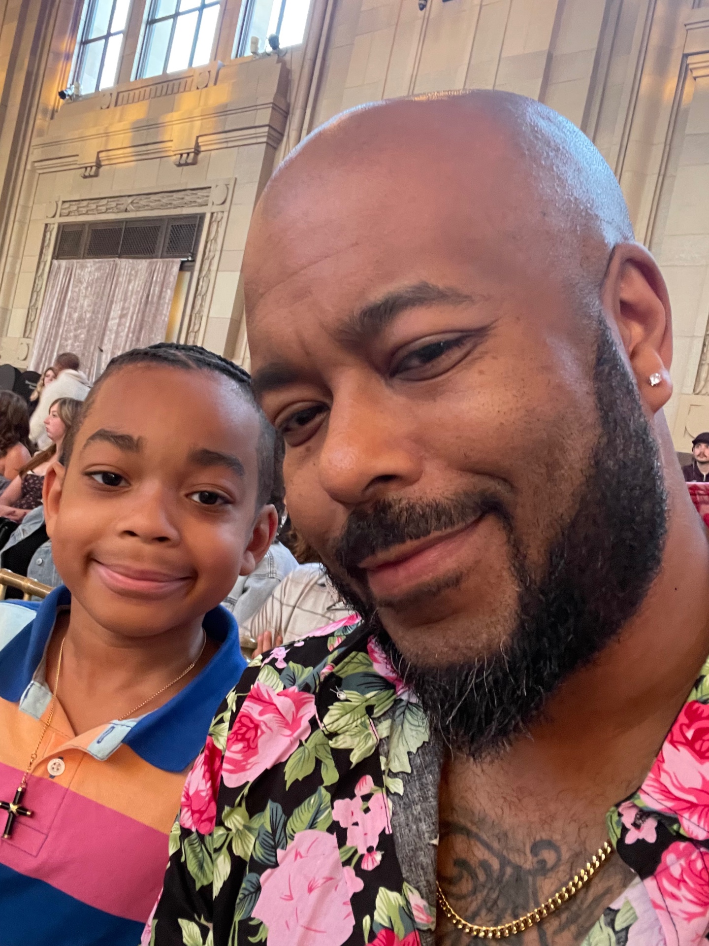 Remy and his son at a fashion event